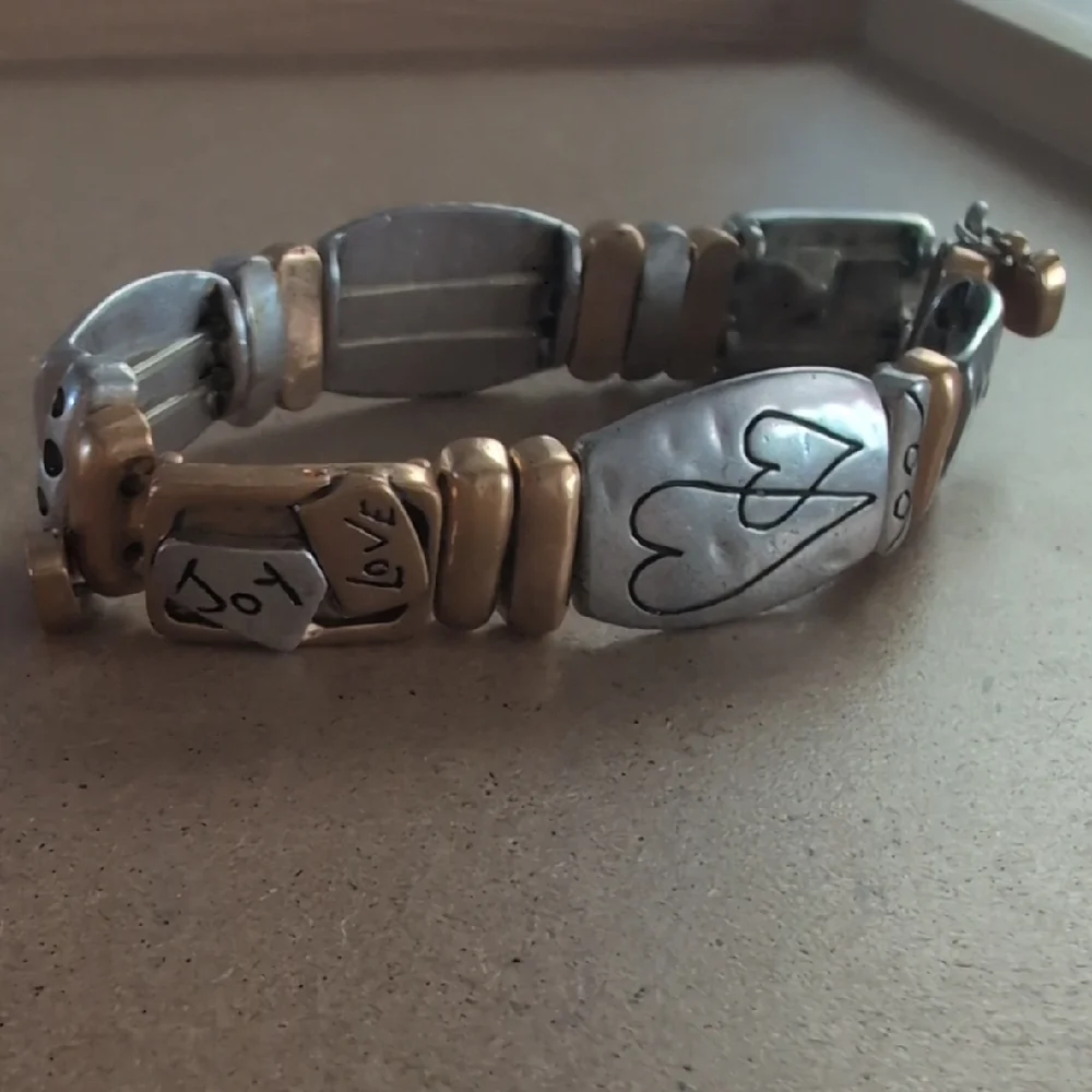 Silver and Gold Tone Heart with Red Crystals Stretch Bracelet